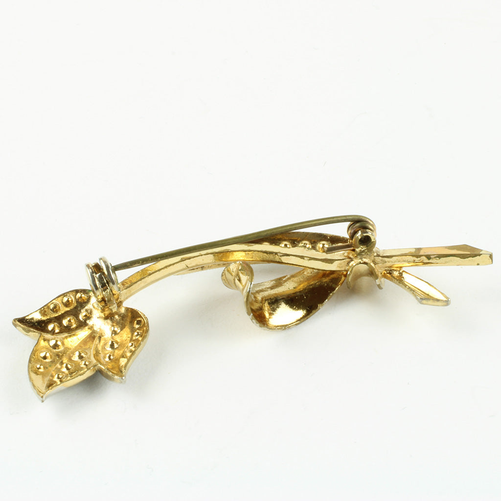 Forgyldt broche med hæmatit