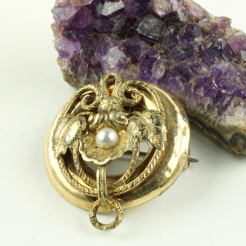 Antik broche af guldblik