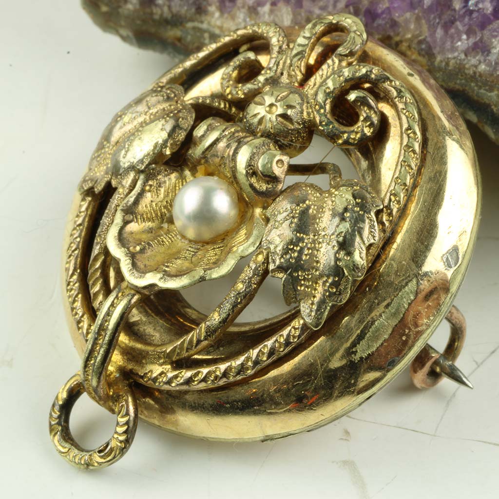 Antik broche af guldblik
