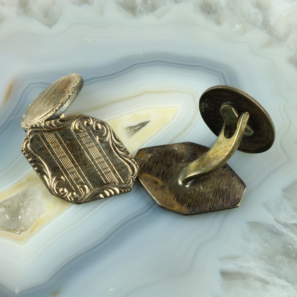 Manchetknapper af forgyldt metal