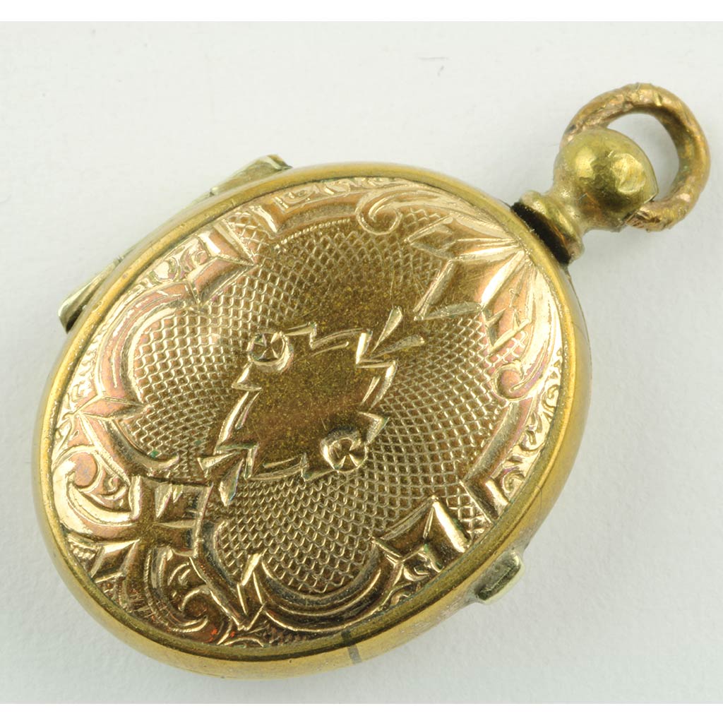 Antik medaljon af forgyldt metal ca. år 1890