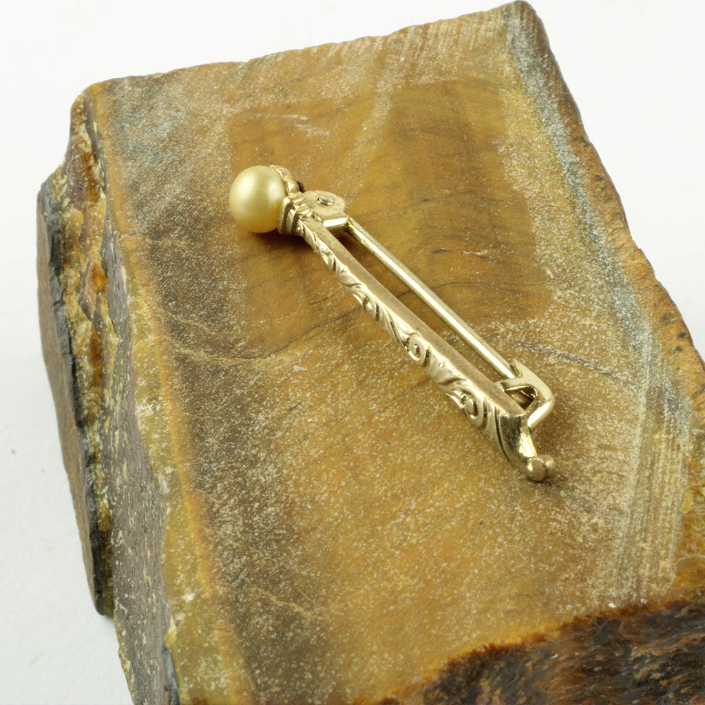 Broche nål af gulddouble