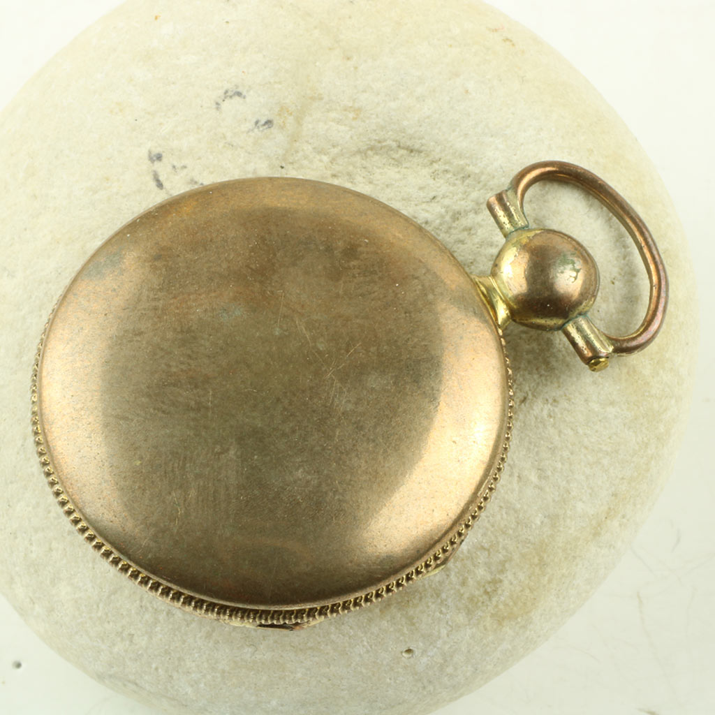 Antik hovedvandsæg i medaljon form