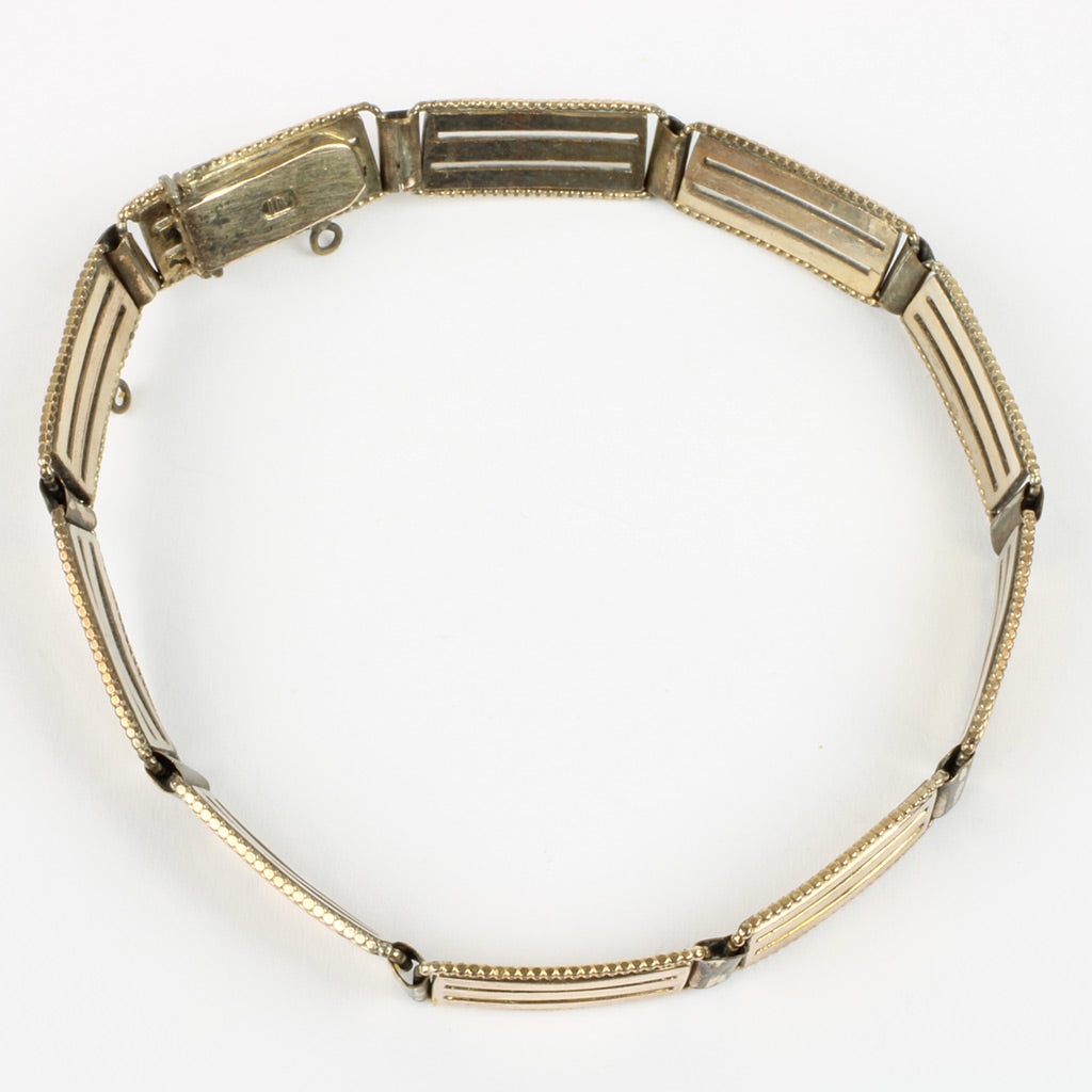 Spændende armbånd af kraftig gulddoublet fra ca. 1900