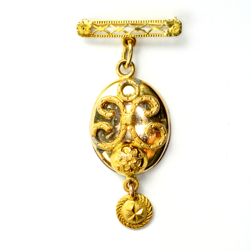 Elegant brochemedaljon i 14K guld