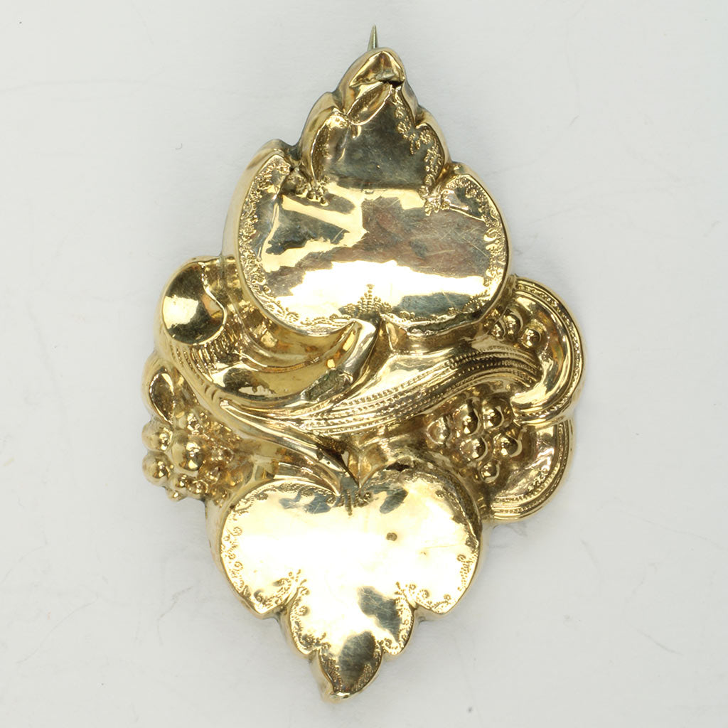 roche af guld eller guldblik af kraftig kvalitet fra ca. år 1900