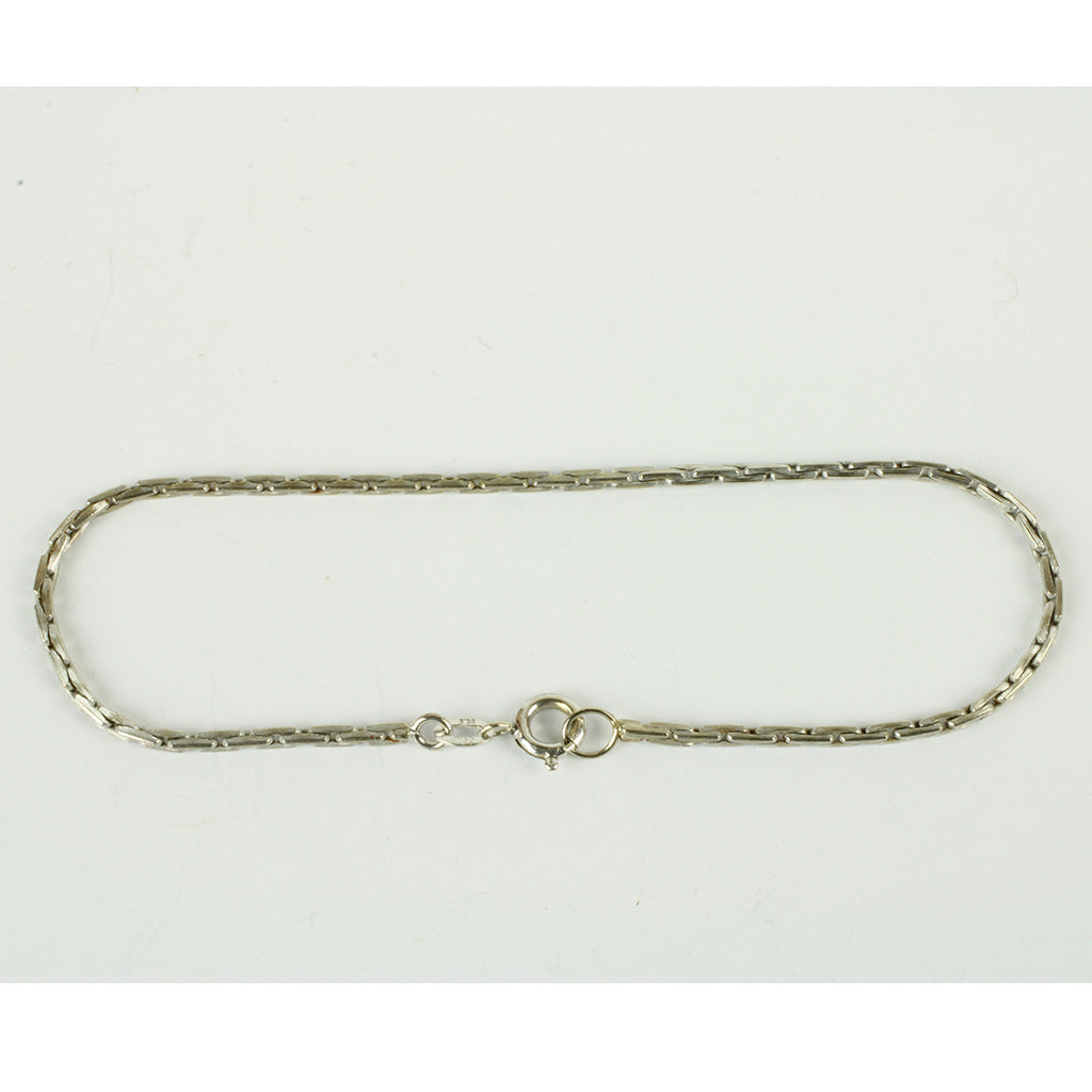 Bent Eriksson armbånd af 14K hvidguld stemplet BE.E samt 585.
