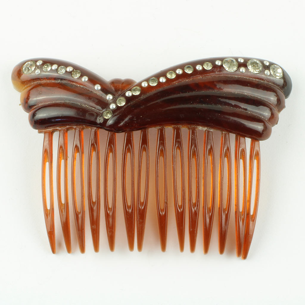 hårkam fra ca. 1930 af celluoid med isatte similistene og små perler