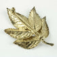Leo Askhem broche af forgyldt rosenblad