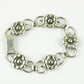Armbånd af sølv med blomster