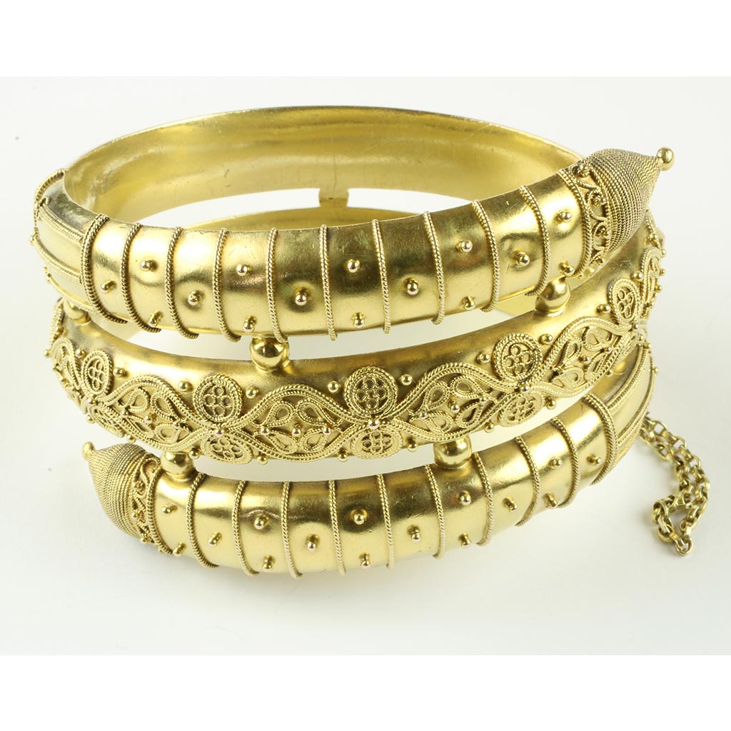 Særdeles spændende antikt smykke af 14 kt. guld i form af armbånd