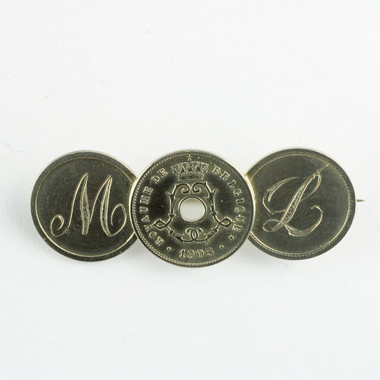 Mønt broche fremstillet af Belgiske sølvmønter
